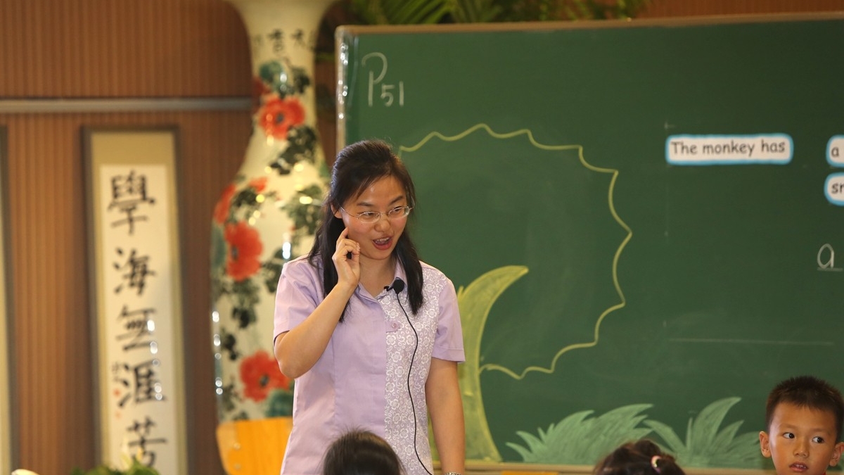清华大学“大、中、小一条龙英语教学”实验项目 课题管理研讨会在我校召开